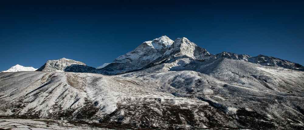 Glimpse of Ama Dablam on the trail from Dingboche to Lobouche.